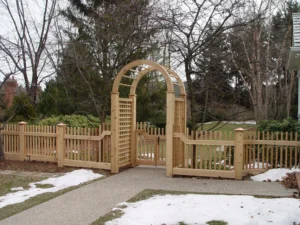 Wood fence with archway gate
