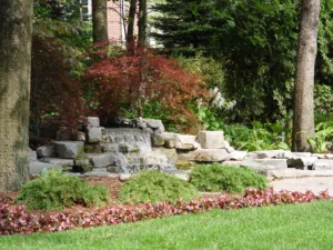 Waterfall fountain in backyard garden